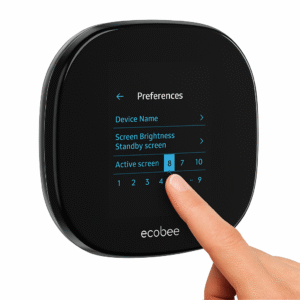 Front-facing view of the thermostat on a wall, displaying temperature and air quality